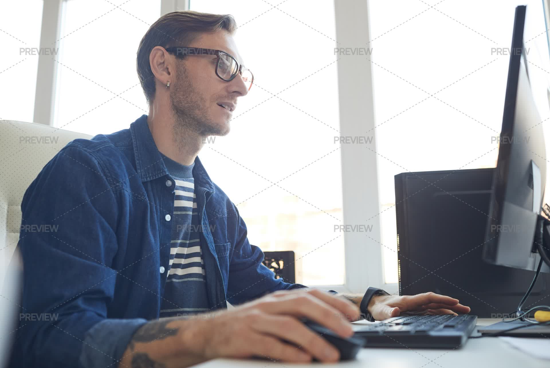 IT Developer Using Computer by SeventyFour - Stock Photos | Motion Array