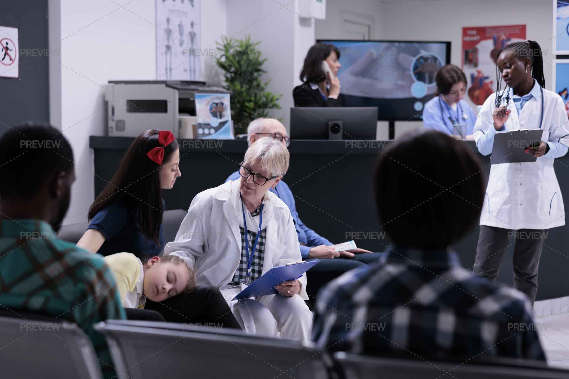 Doctor Completing Form For Patient by DCStudio - Stock Photos | Motion ...