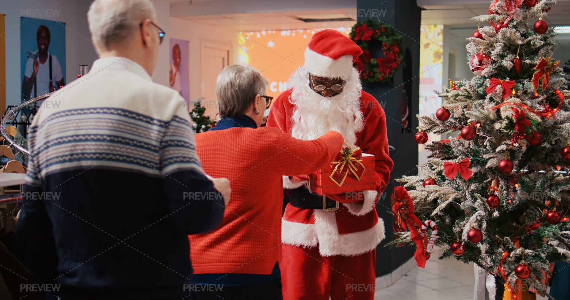 Santa Clause Raffle Santa Claus Employee Holding Raffle - Stock Photos | Motion Array