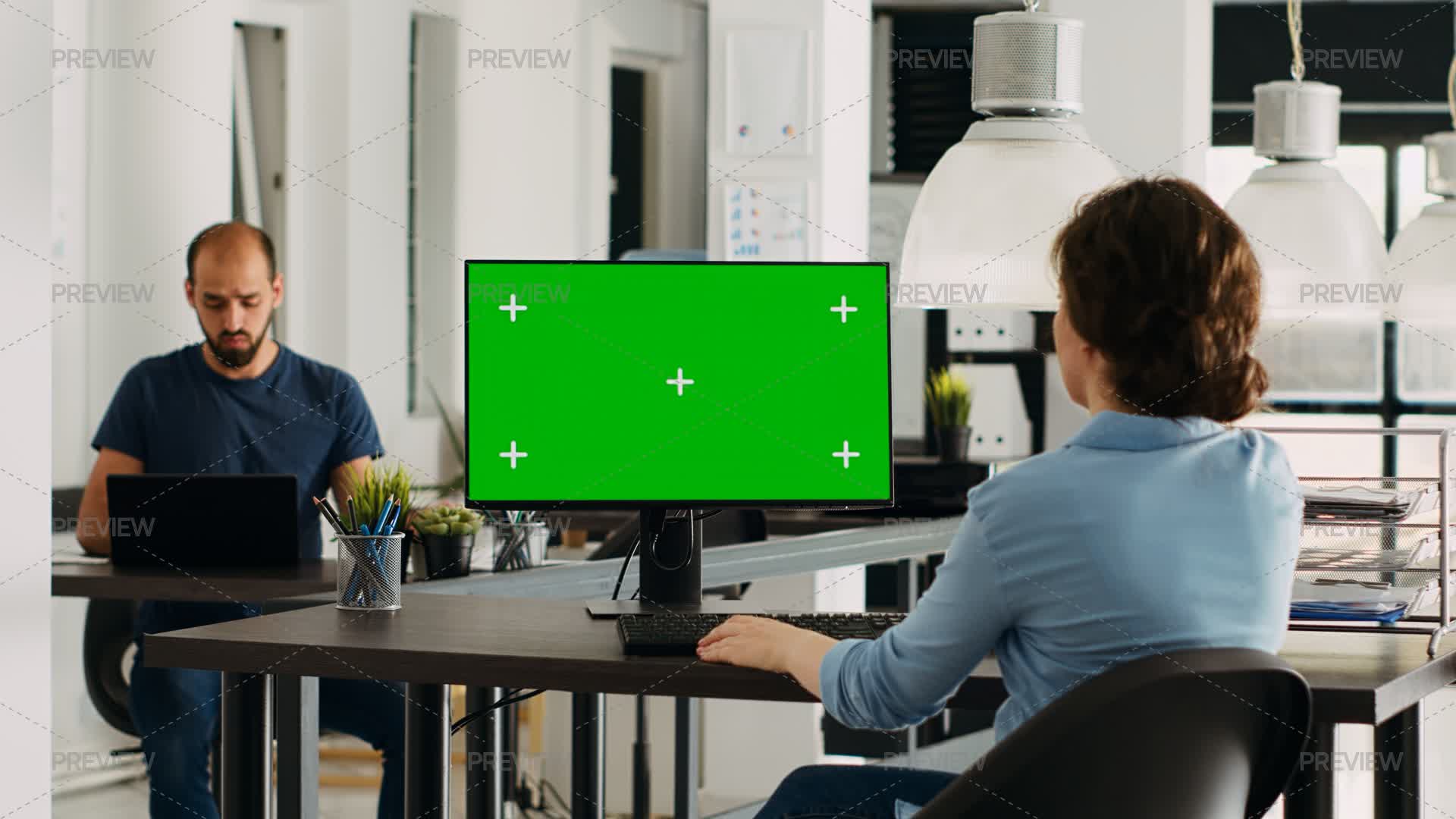 Employee Using Computer At Desk by DCStudio - Stock Photos | Motion Array
