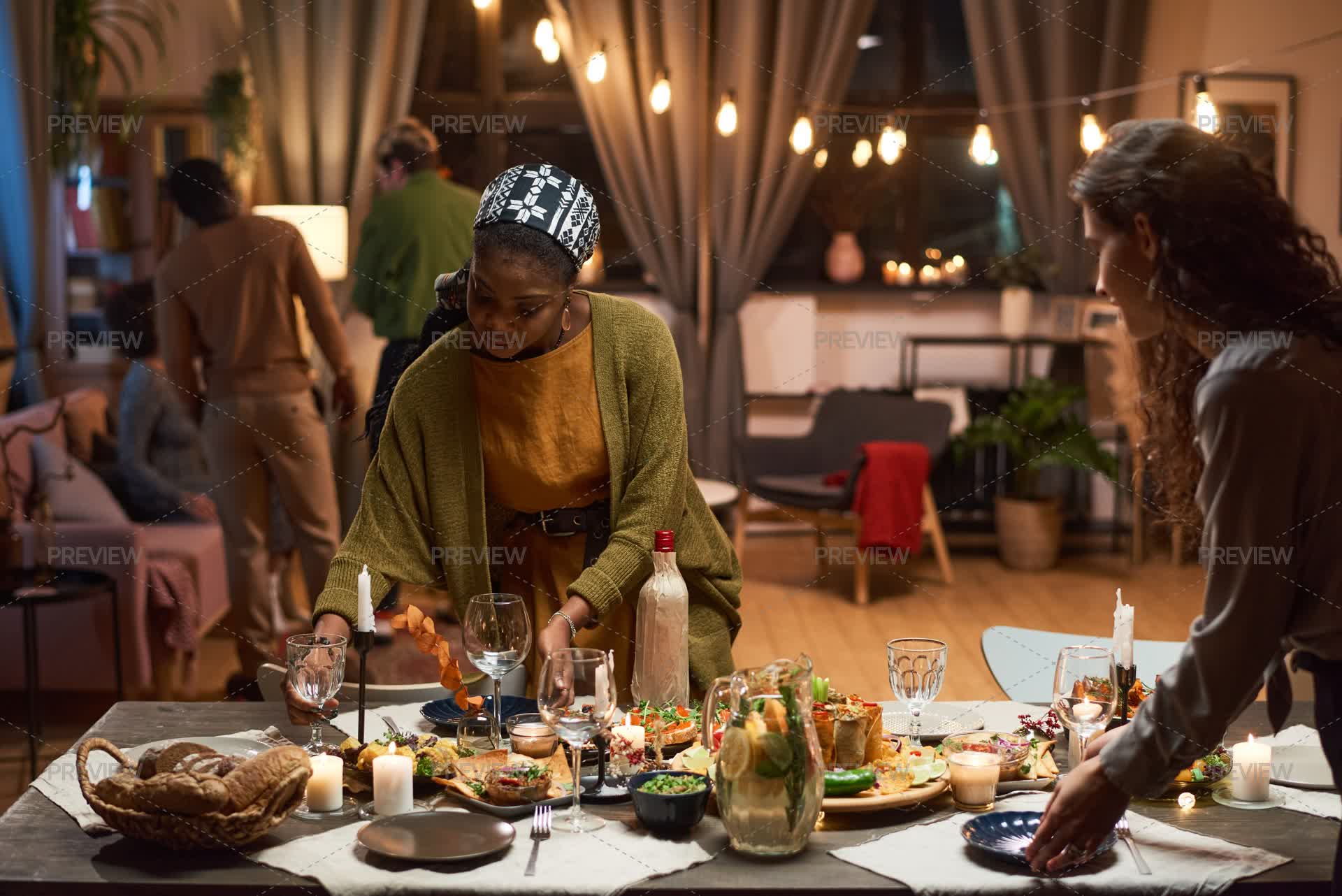 Women Table Women Setting The Dining Table For Dinner - Stock Photos | Motion Array