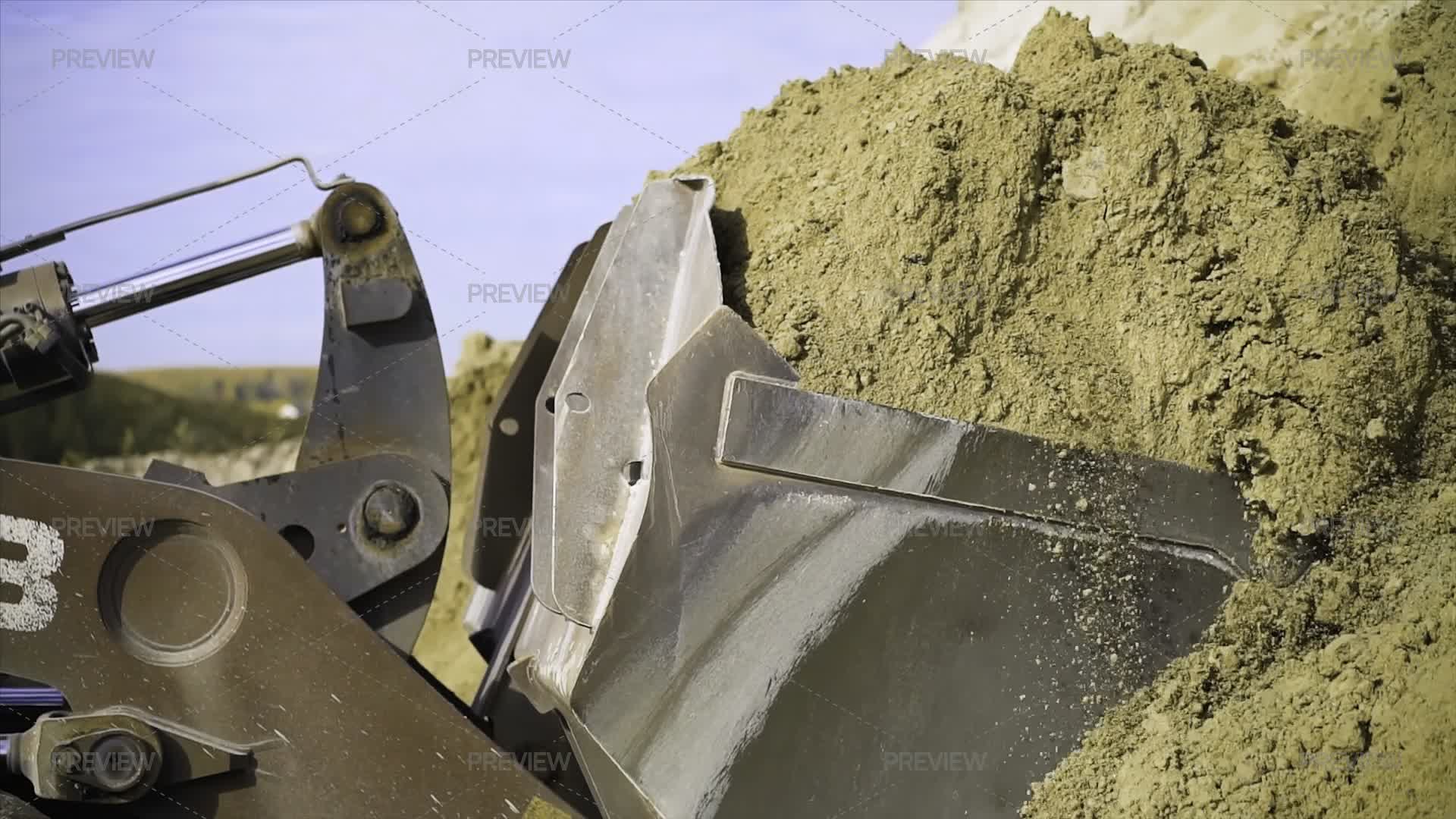 Dig Operation Close-up Of Excavator Digging Up Ground. Digging Operations Using ...