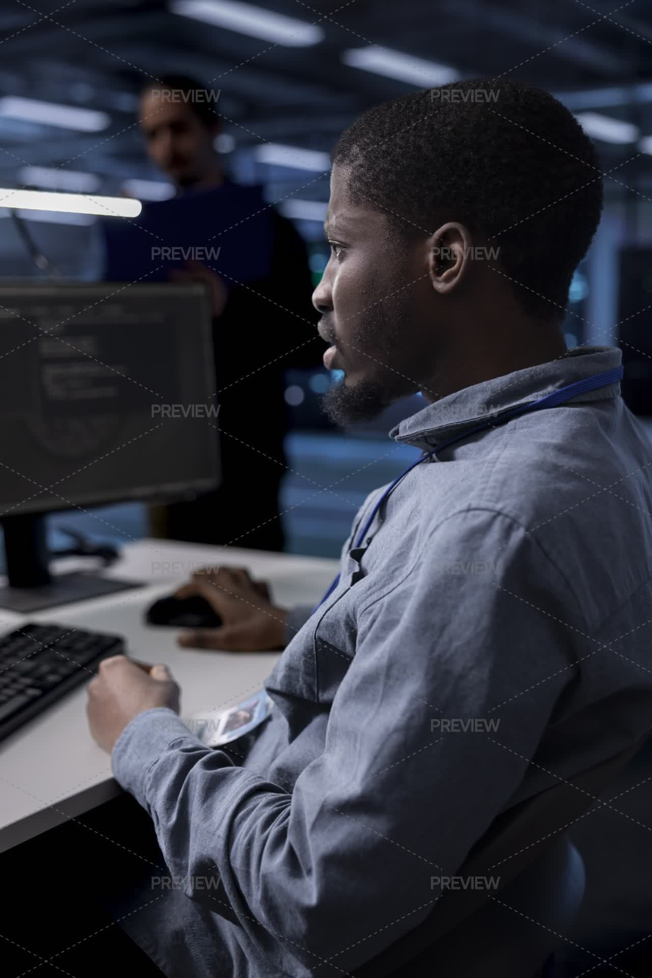 Worker Looking For Errors Causing Hardware To Slow Down - Stock Photos ...