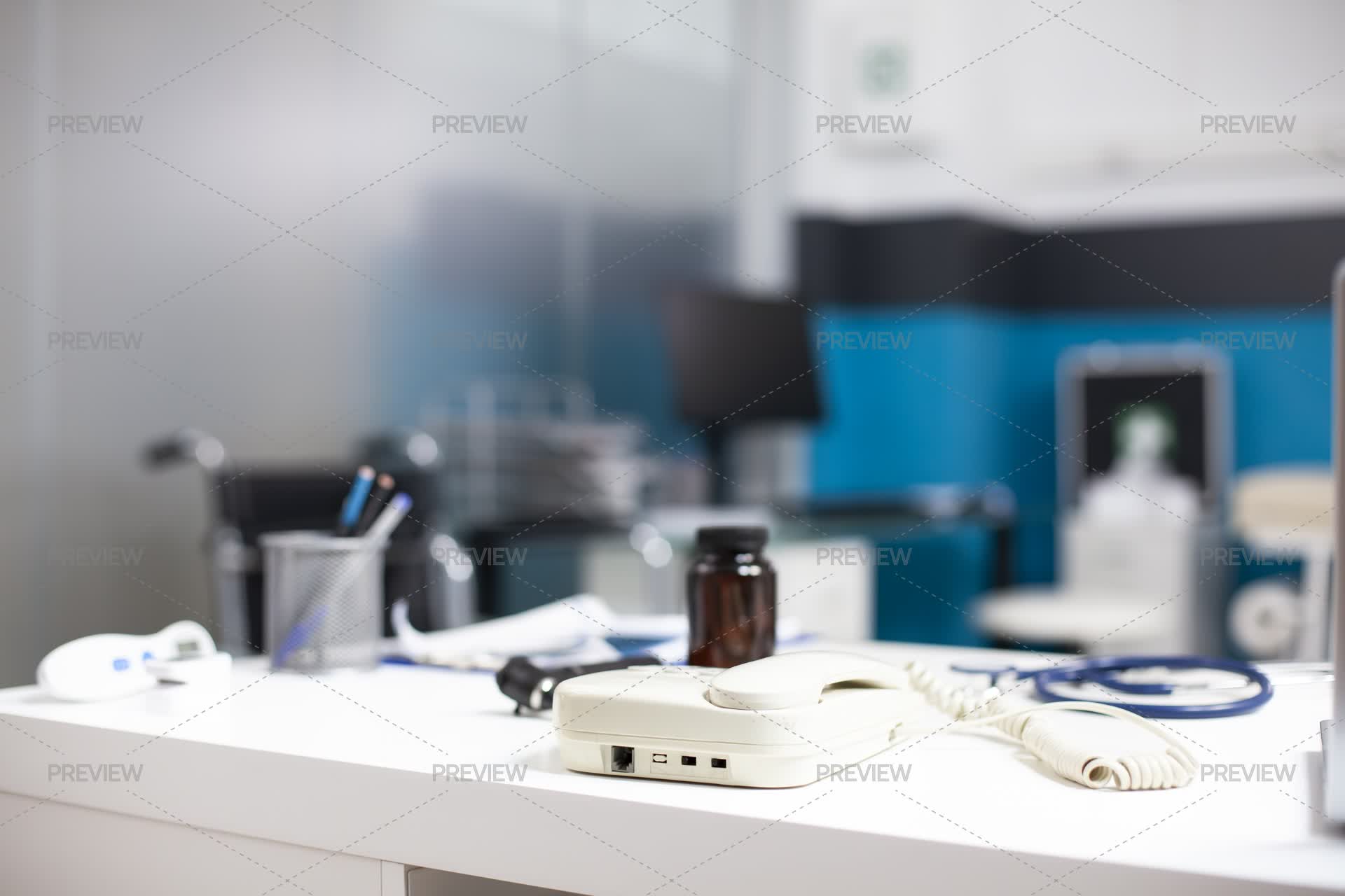Telephone And Medical Tools On Desk - Stock Photos | Motion Array