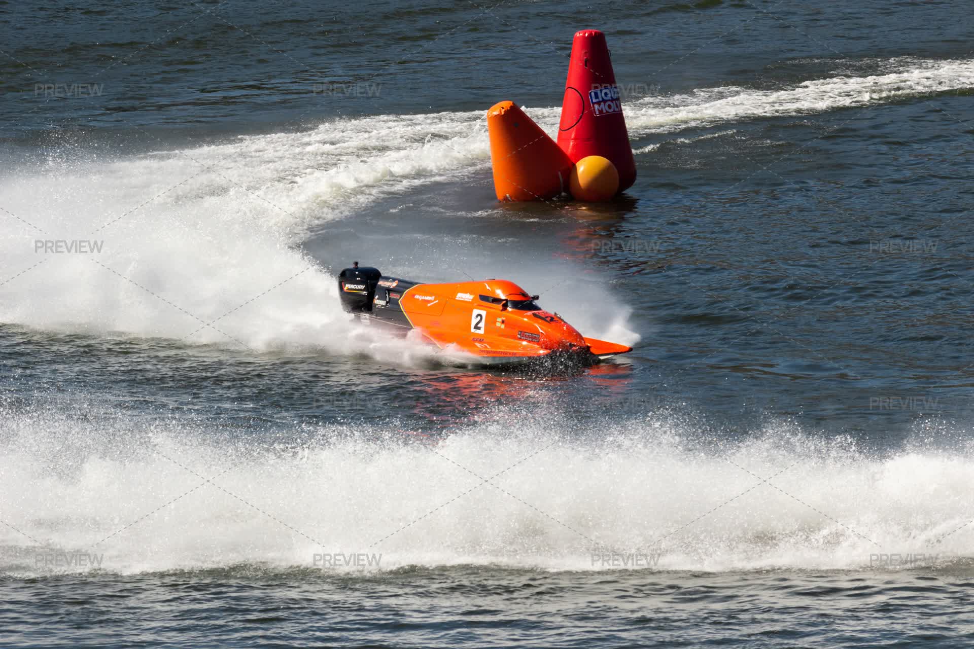 Red Powerboat Makes Sharp Turn With Splashes Of Water During Race. Red ...