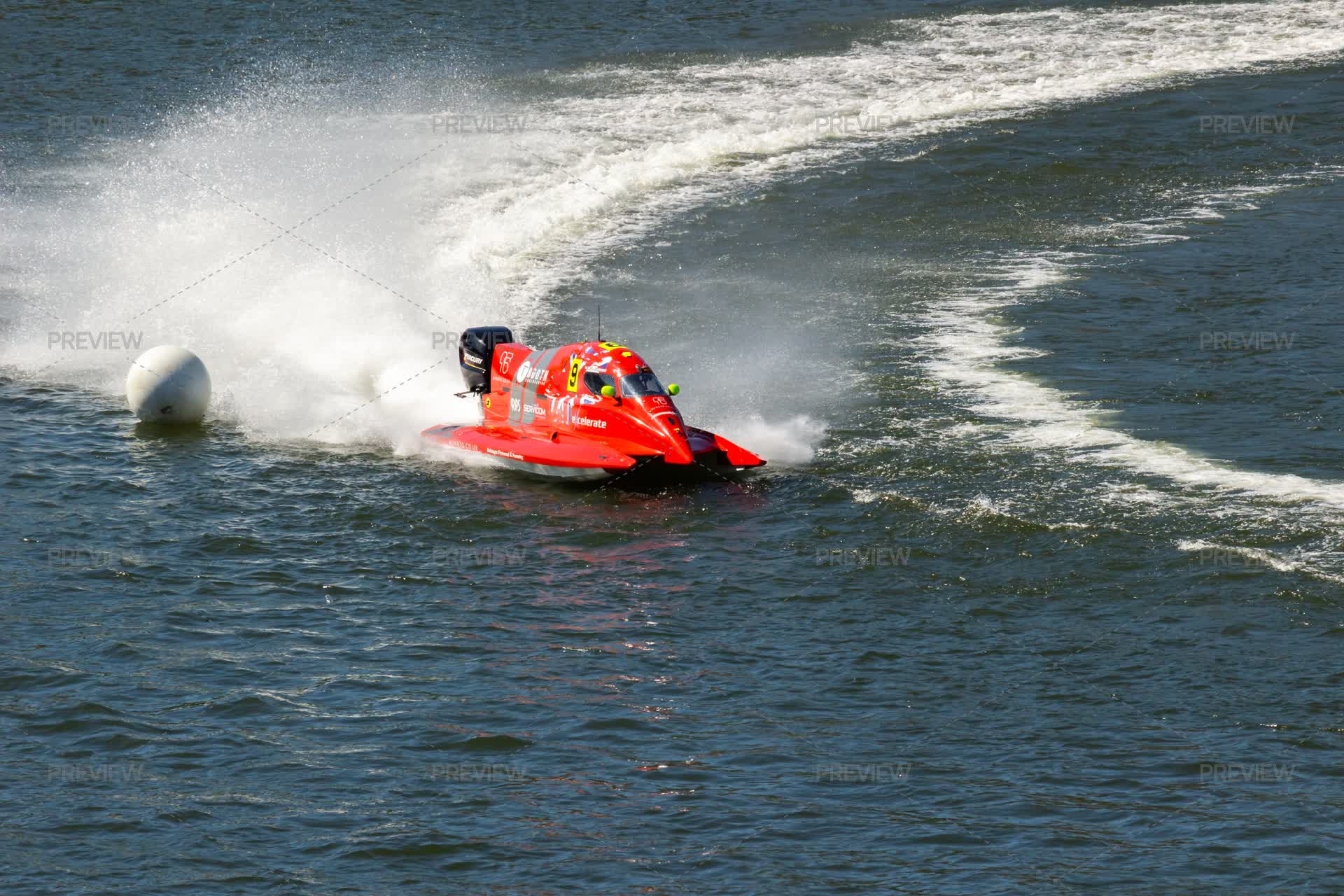 Red Powerboat Racing Red Powerboat Makes Sharp Turn With Splashes Of Water During Race ...