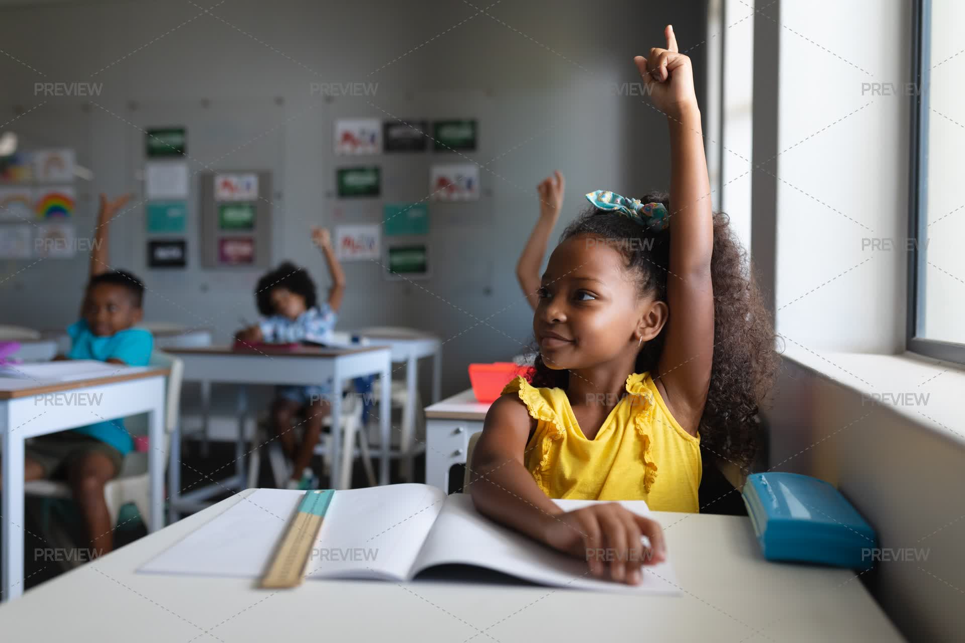 Children Raising Hands In Classroom by Wavebreak Media - Stock Photos ...