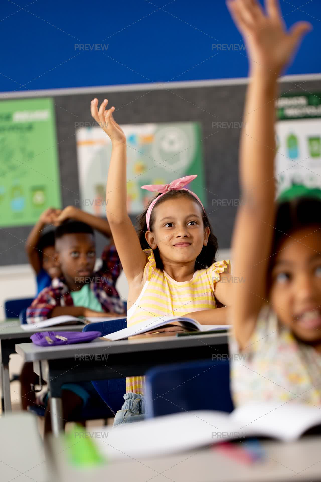 Children Raising Hands In Class - Stock Photos | Motion Array