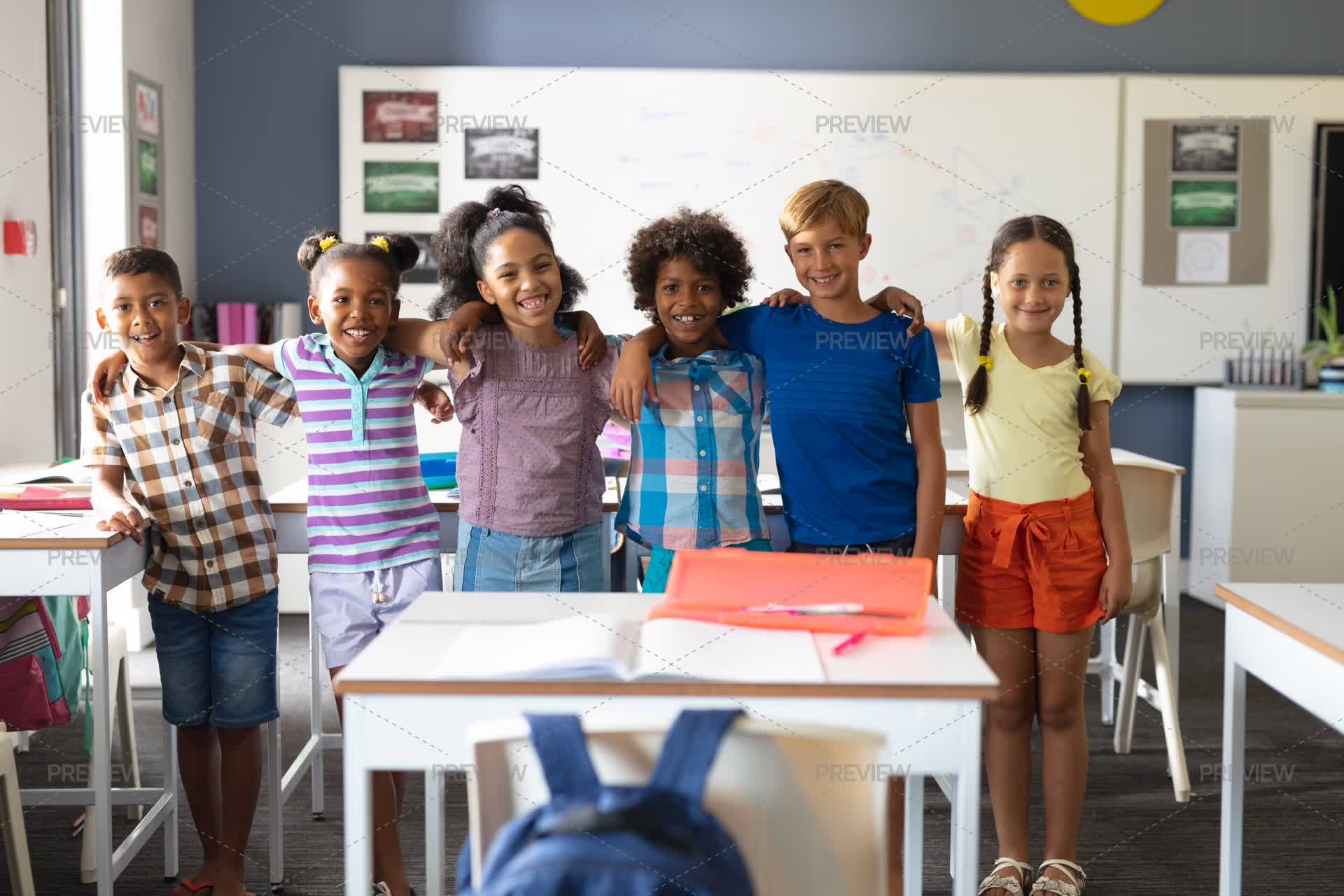 Students Standing Group Of Students Standing In Classroom - Stock Photos | Motion Array