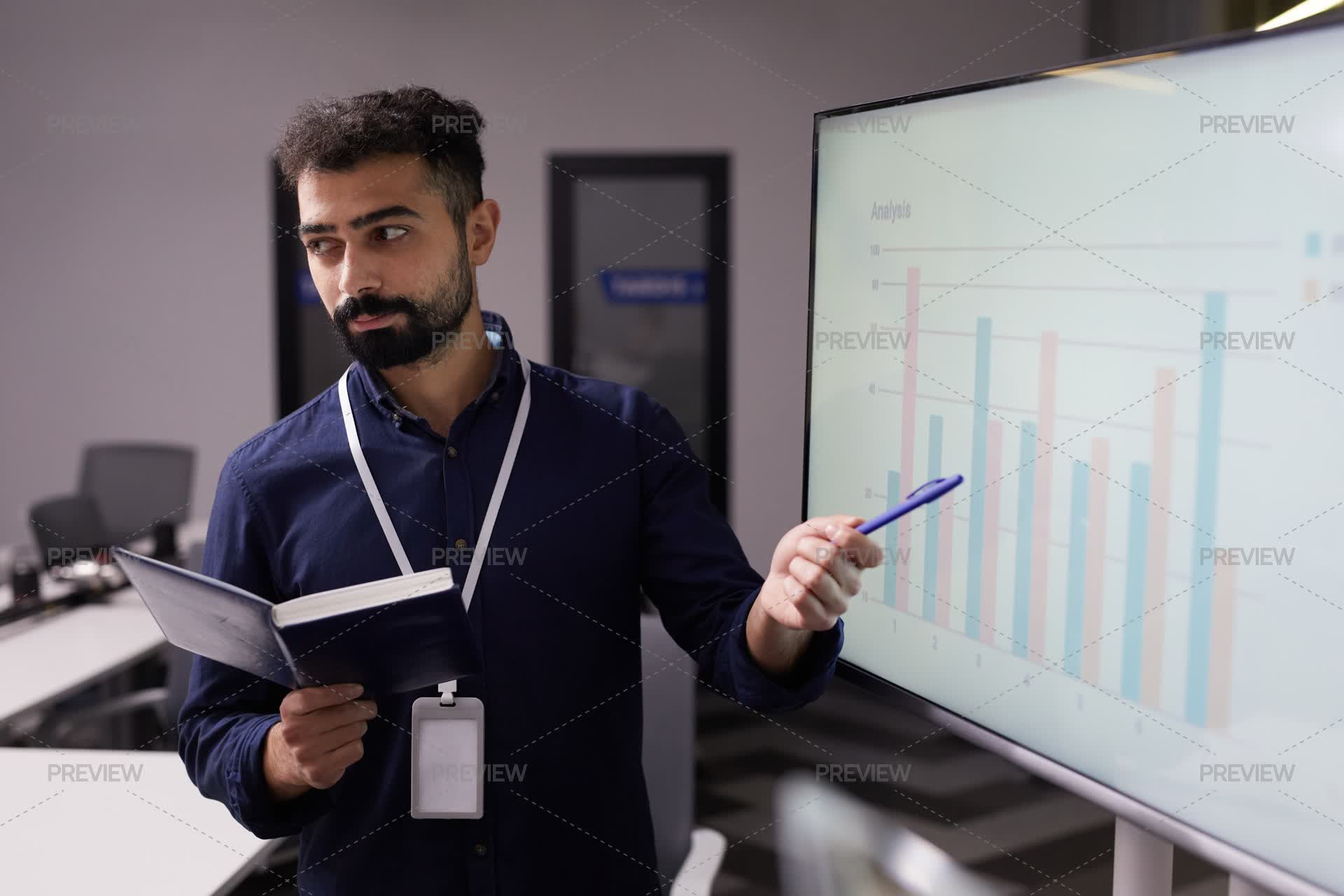 Speaker Pointing At Interactive Whiteboard With Charts - Stock Photos ...