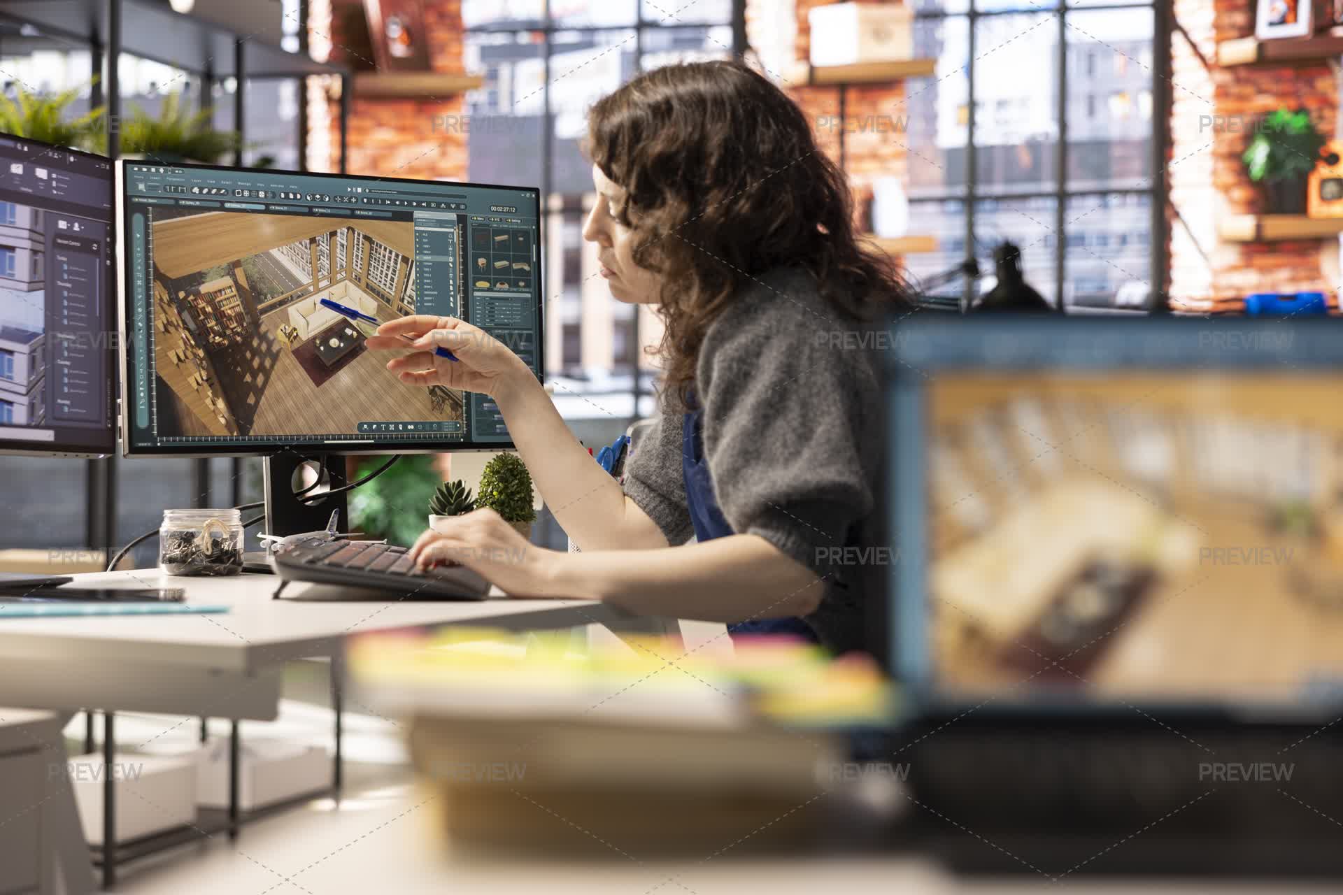 Woman Developer Works On An Interior Design Project Using CAD Software ...