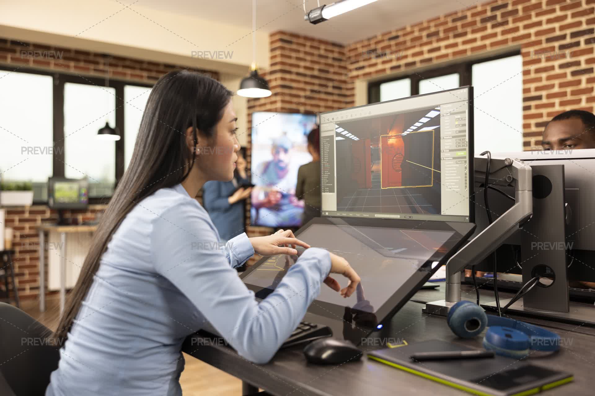 Developer Creating 3D Game Scenes - Stock Photos | Motion Array