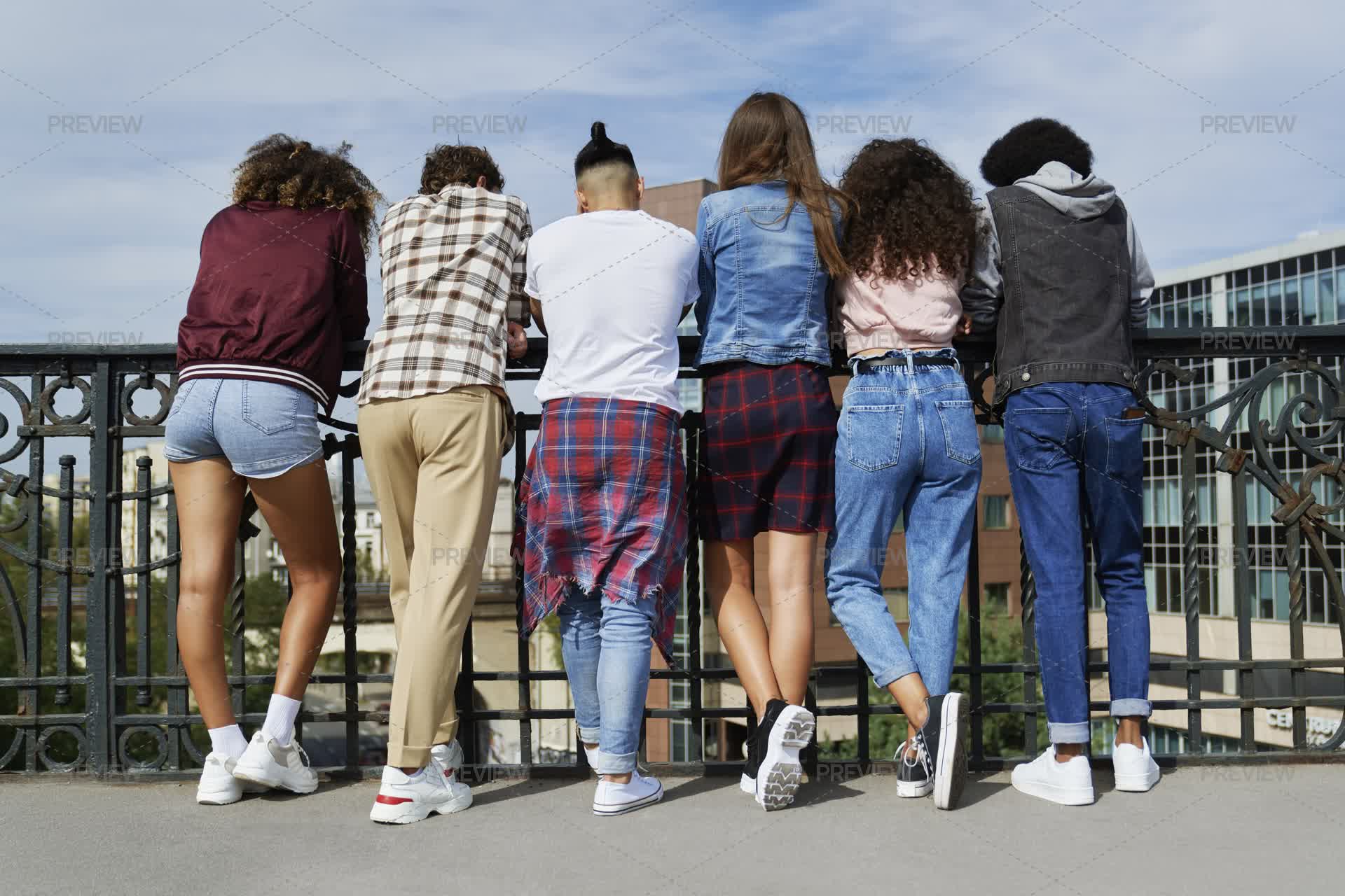 People Standing Behind Railing Rear View Of People Standing In Front Of The Railing - Stock Photos ...