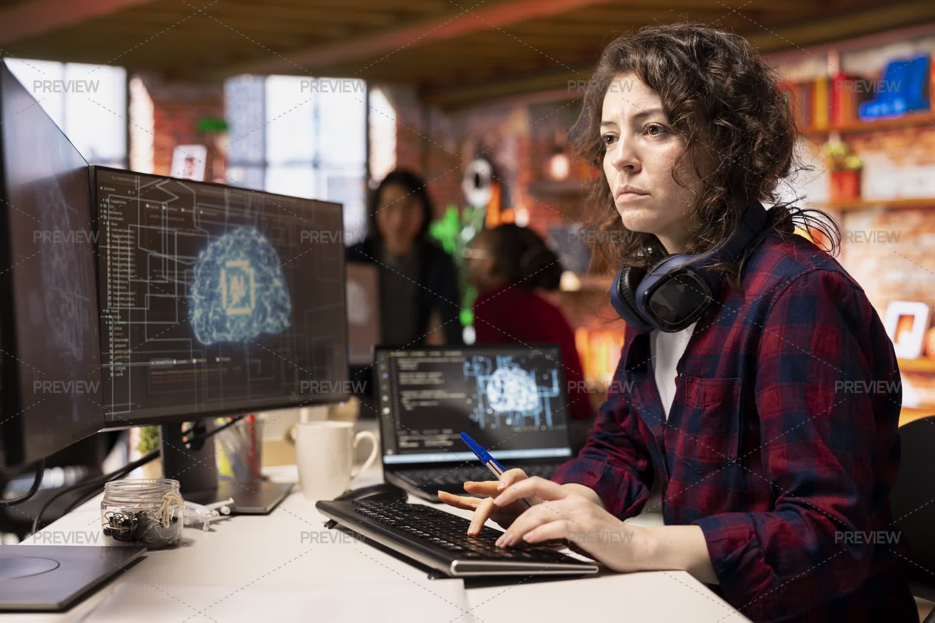 Programmer Building Programmer Coding In Fast Paced AI Startup Office, Building Scalable ...