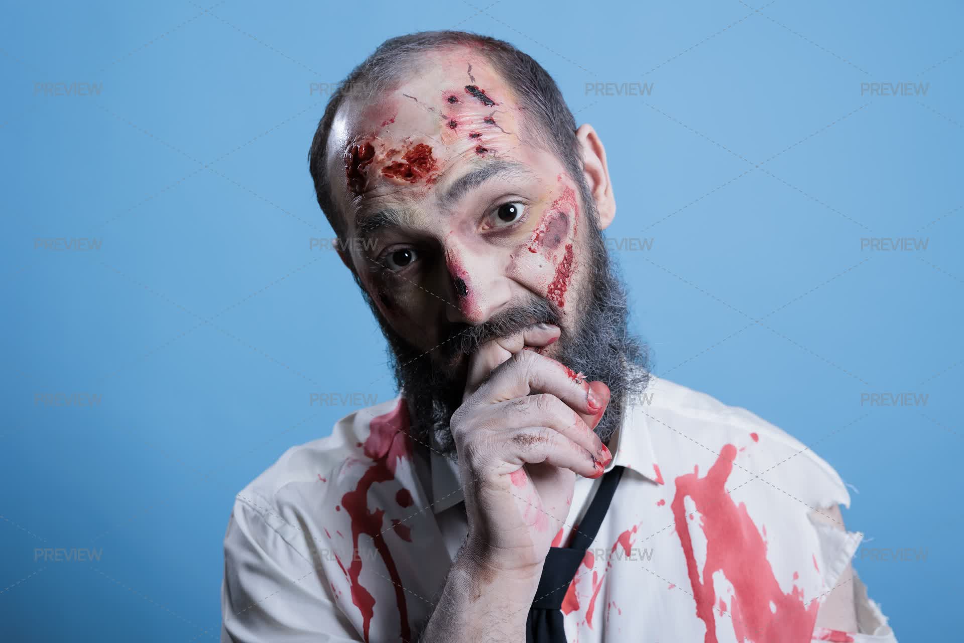Portrait Of Actor Dressed As Creepy Horror Movie Zombie With Gore ...