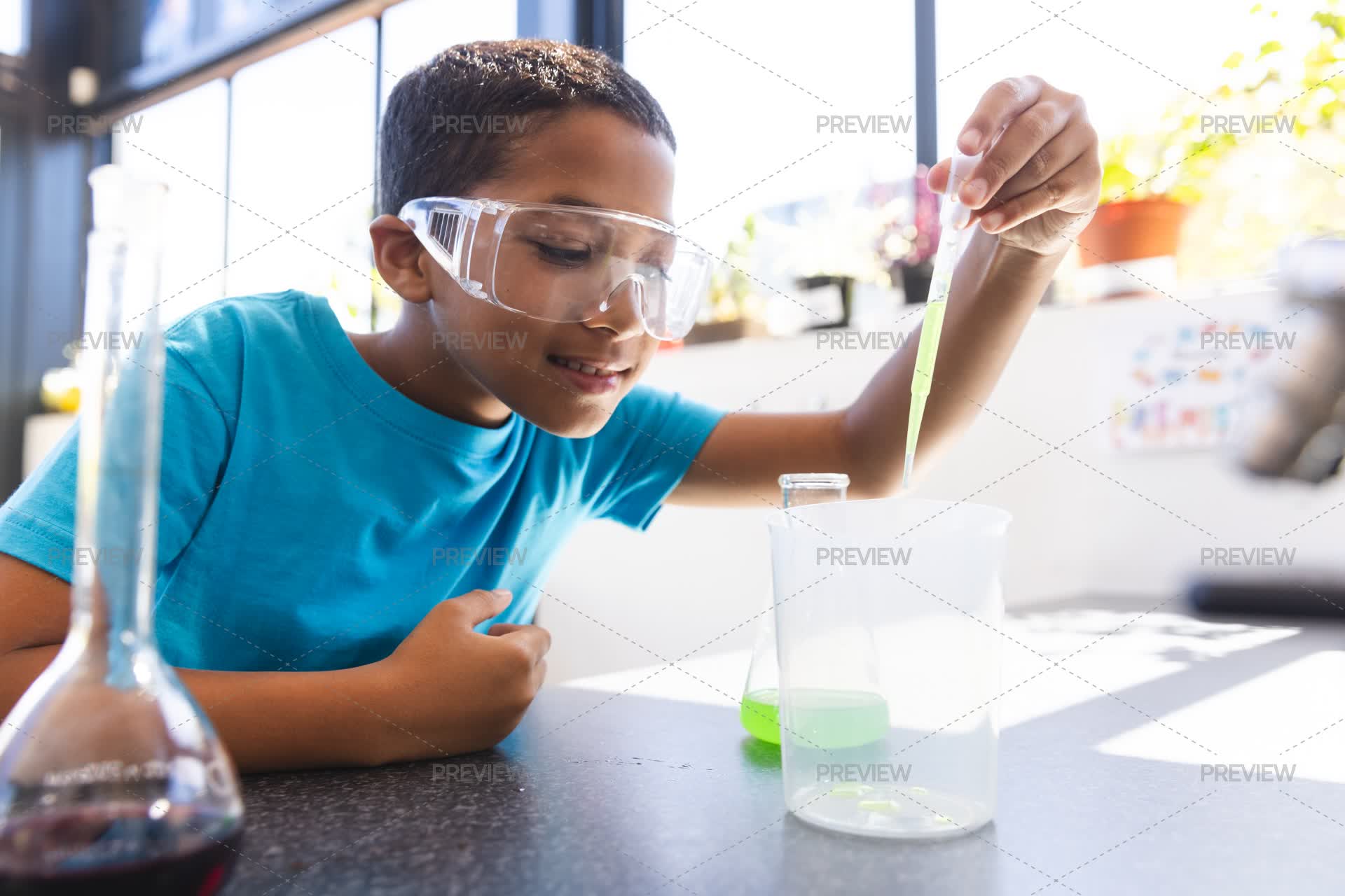 Boy Body Experiments Boy Conducting Science Experiment - Stock Photos | Motion Array