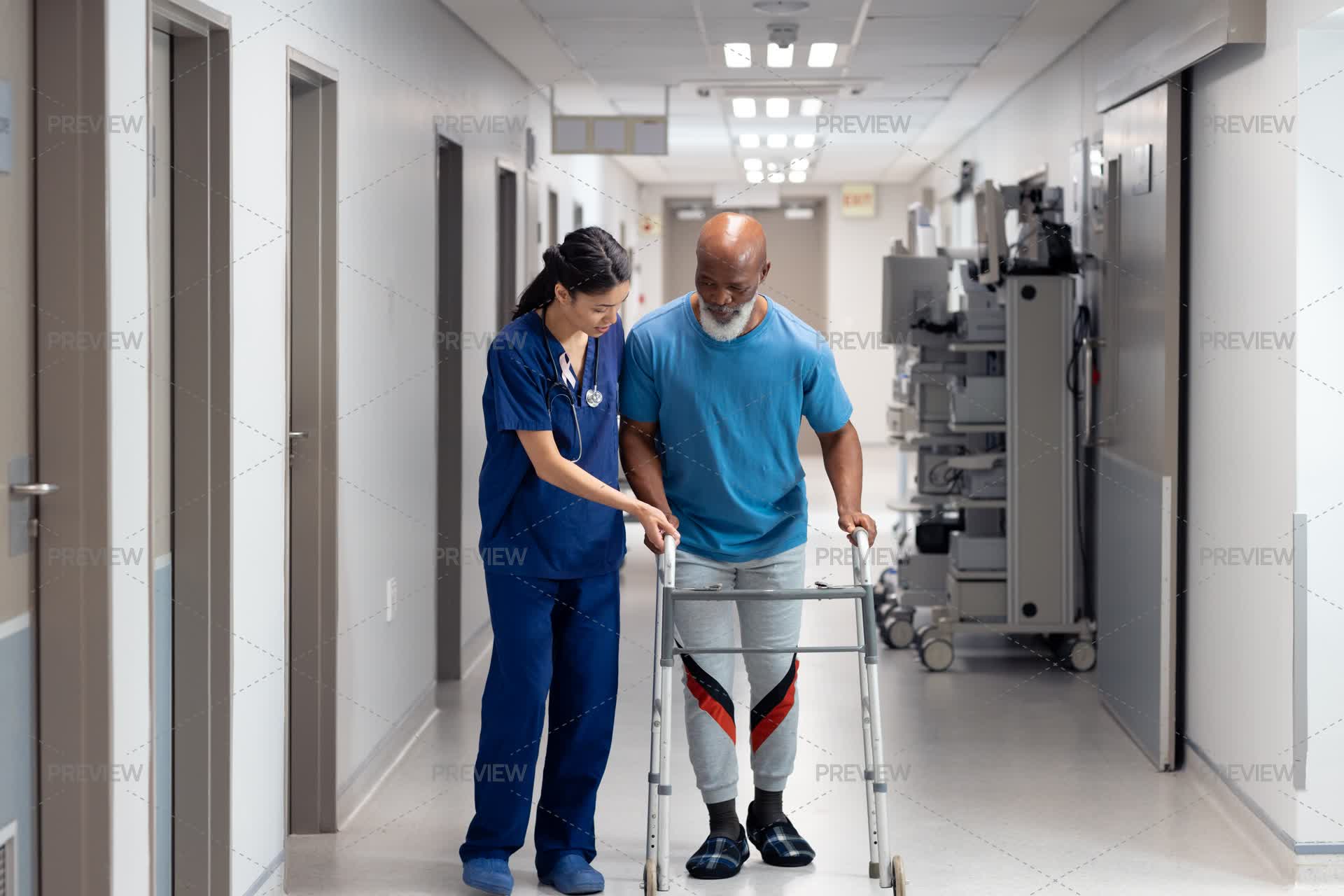 Snurse Using Walker Nurse Assisting Patient With Walker - Stock Photos | Motion Array