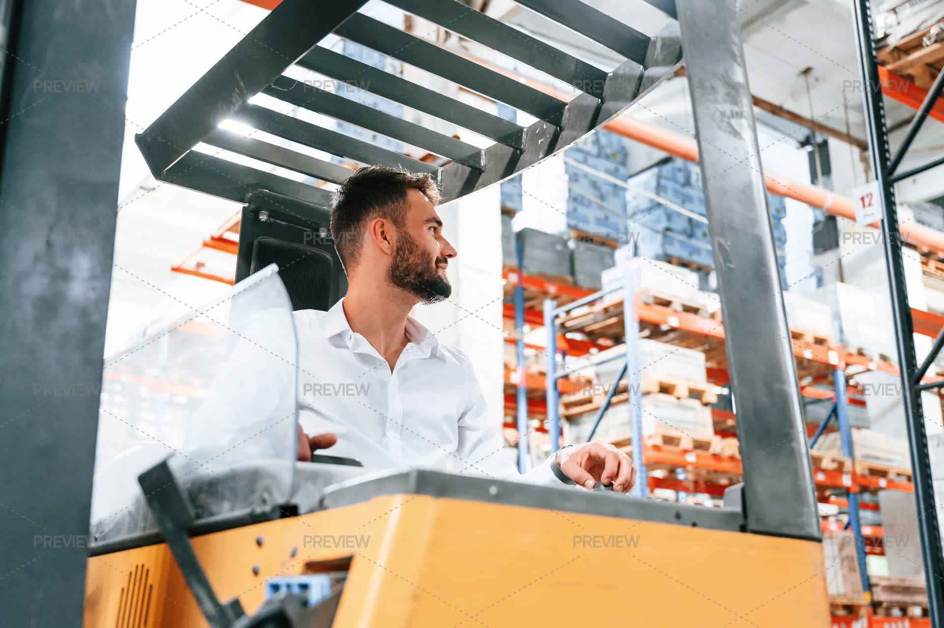 Cargo Moving Machine Storage Worker Using Cargo Moving Machine In The Warehouse - Stock ...