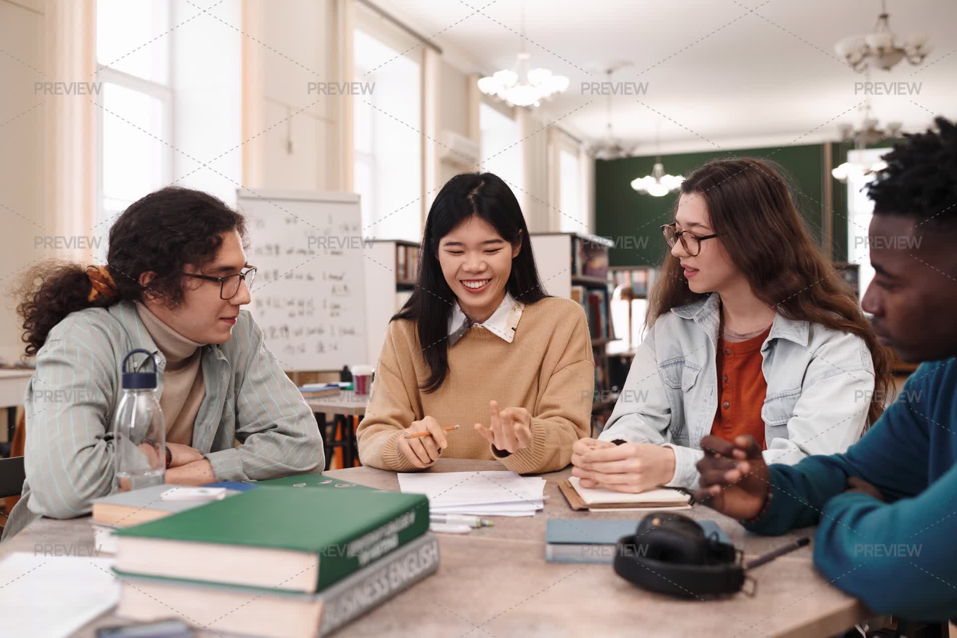 Multiethnic Group Of Students Studying In The School Library - Stock ...