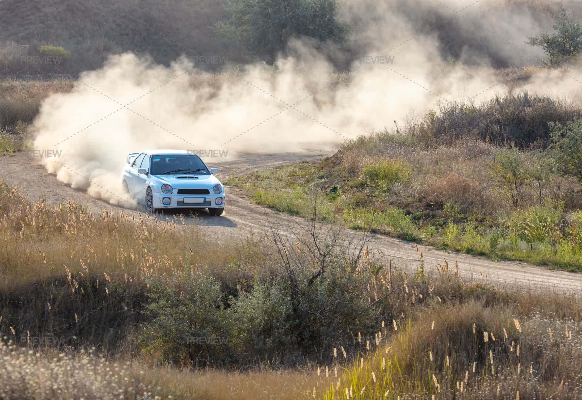 Sharpness Car Rally Rally Car Completes A Sharp Turn On A Dusty Road - Stock Photos ...
