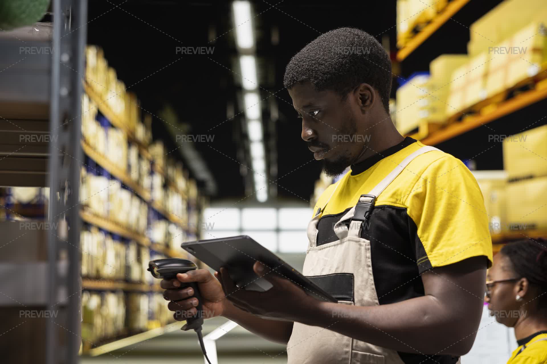Fulfillment Center Worker Scanning Shipping Labels To Register In ...