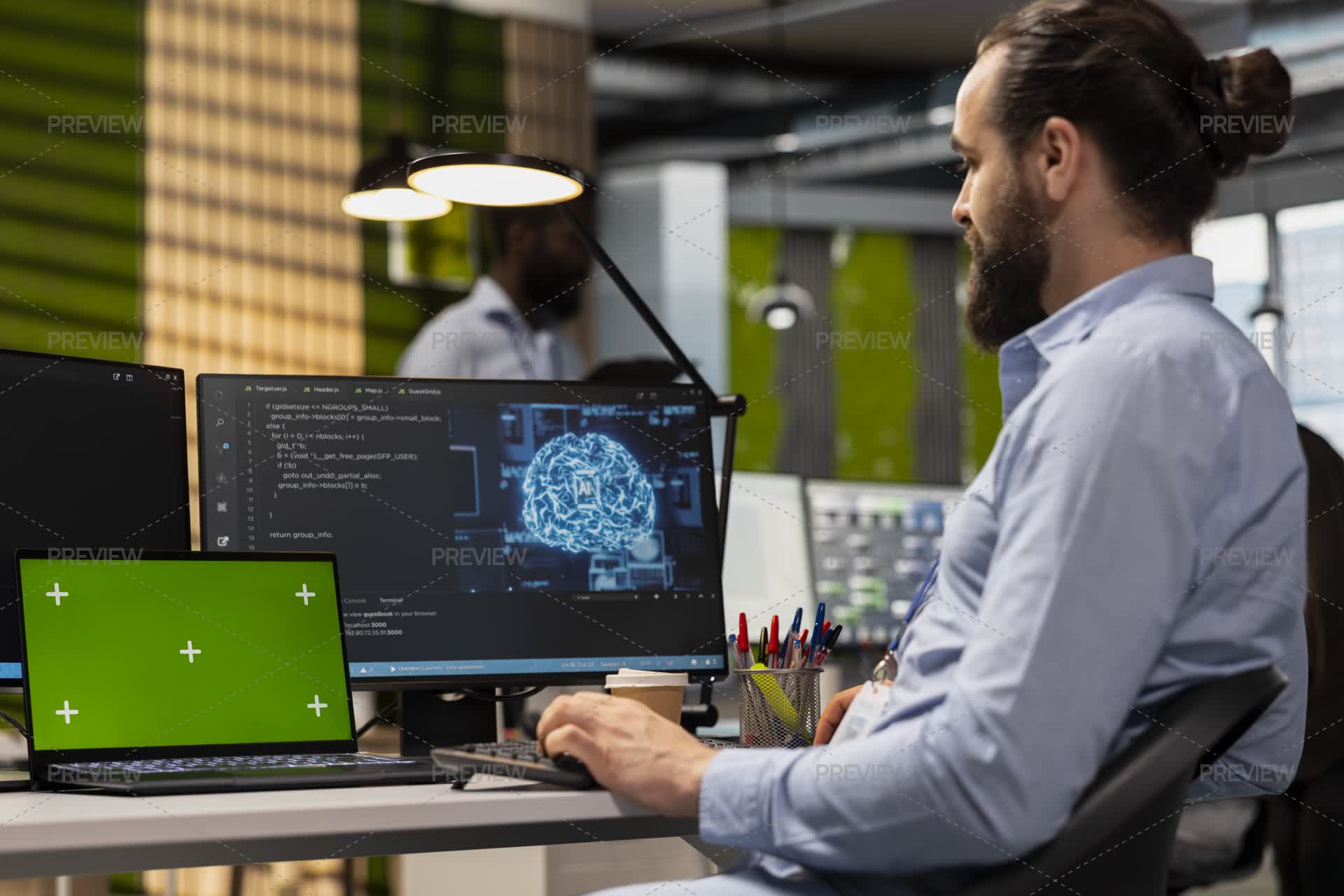 Technician Using Green Screen Tablet To Code AI Algorithms - Stock ...