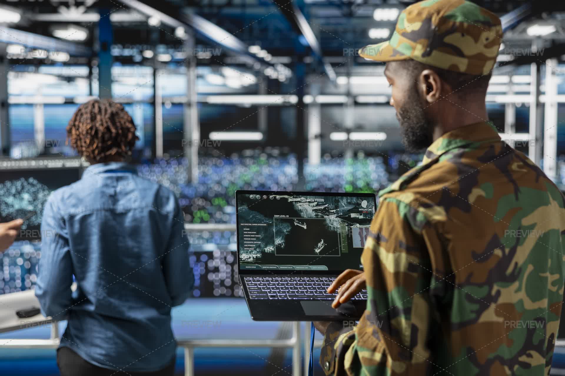 IT Military Expert In Server Room Supervising High Tech Defense Systems ...