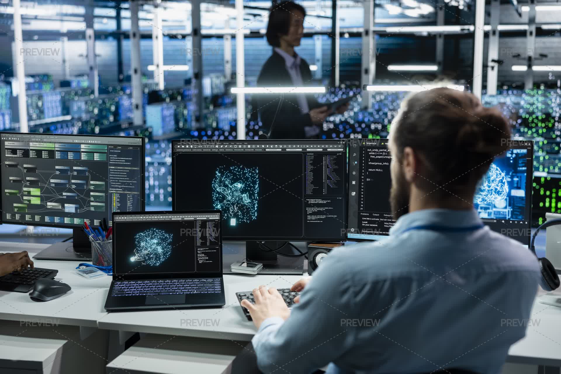 Programmer Working In Data Center With Hardware Managing AI Training ...