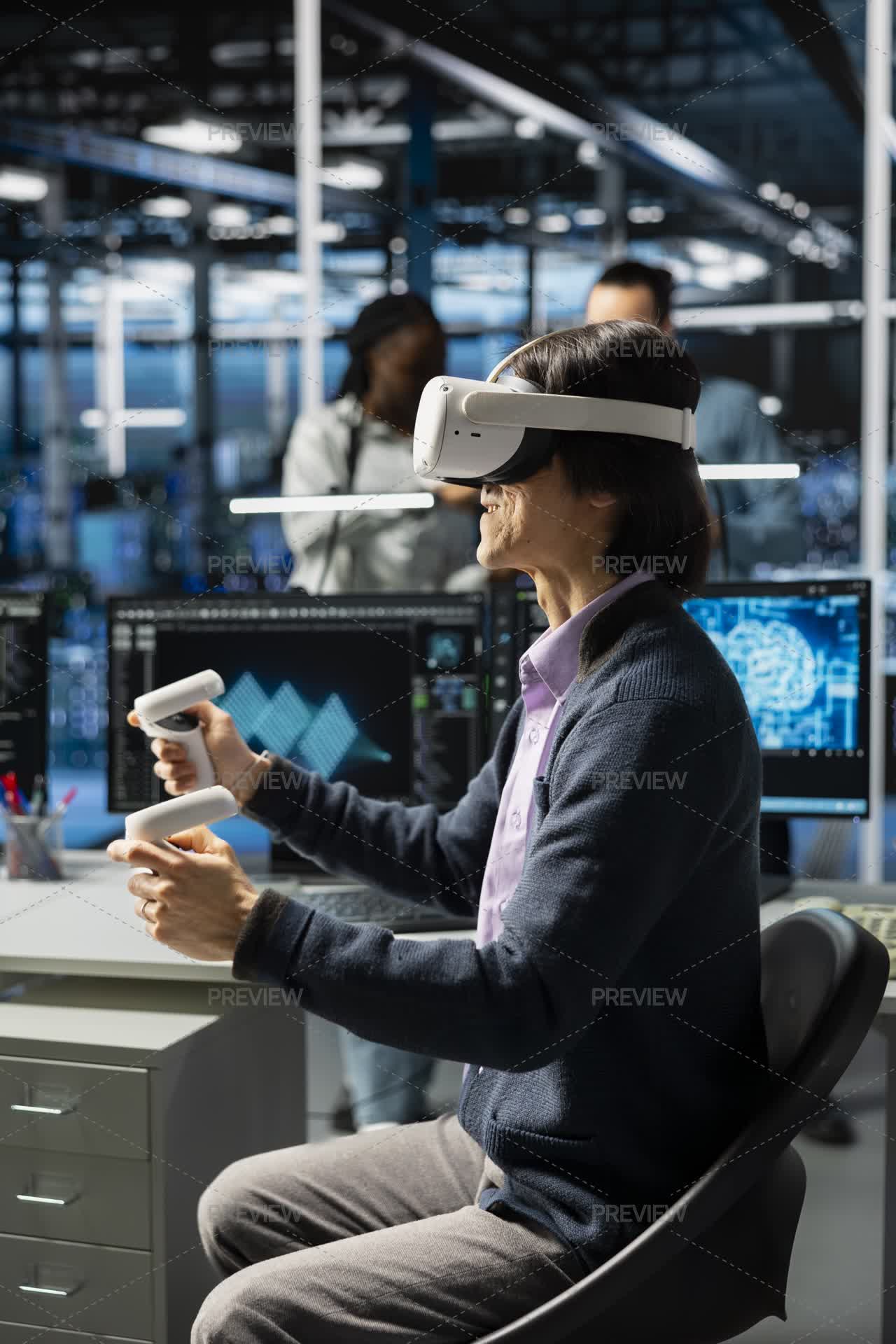 Developer Wearing VR Headset Coding In Data Center, Updating AI Scripts ...