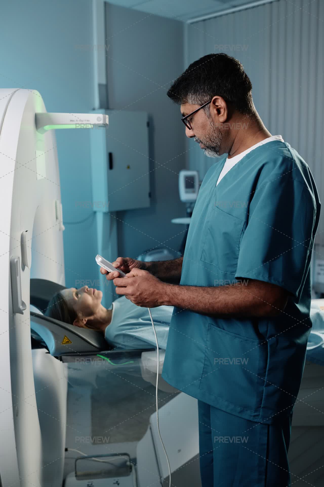 Radiologist Setting MRI Scanner For Patient - Stock Photos | Motion Array
