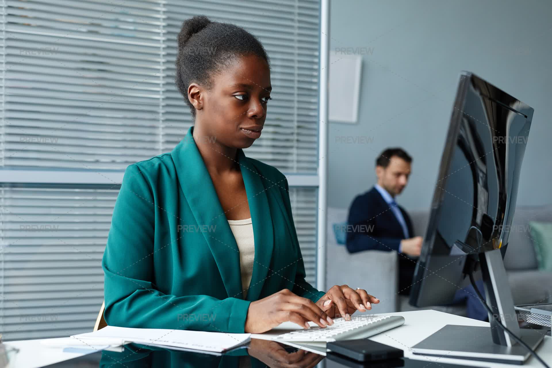 Office Worker Using Computer by SeventyFour - Stock Photos | Motion Array