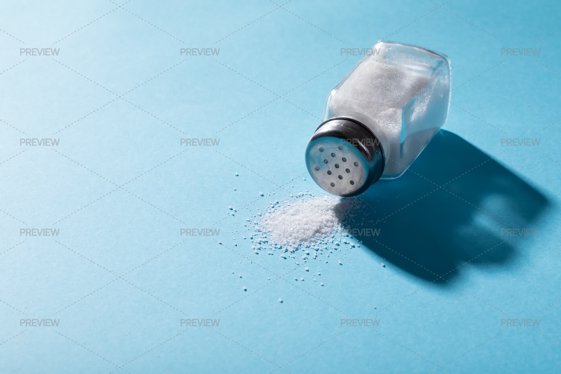 Salt Shaker Inmotion Salt Shaker On Blue Background - Stock Photos | Motion Array