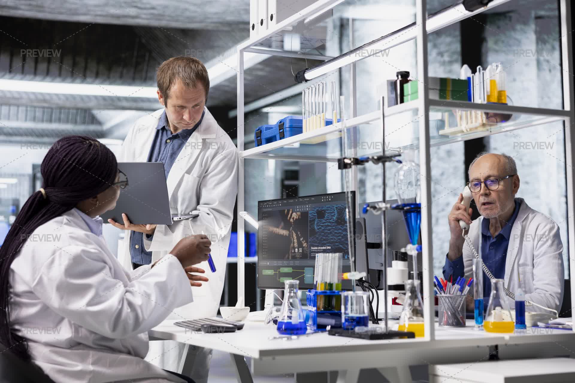 Molecule R Lab Diverse Researchers Collaborate In Lab With Molecular Analysis Tools by ...