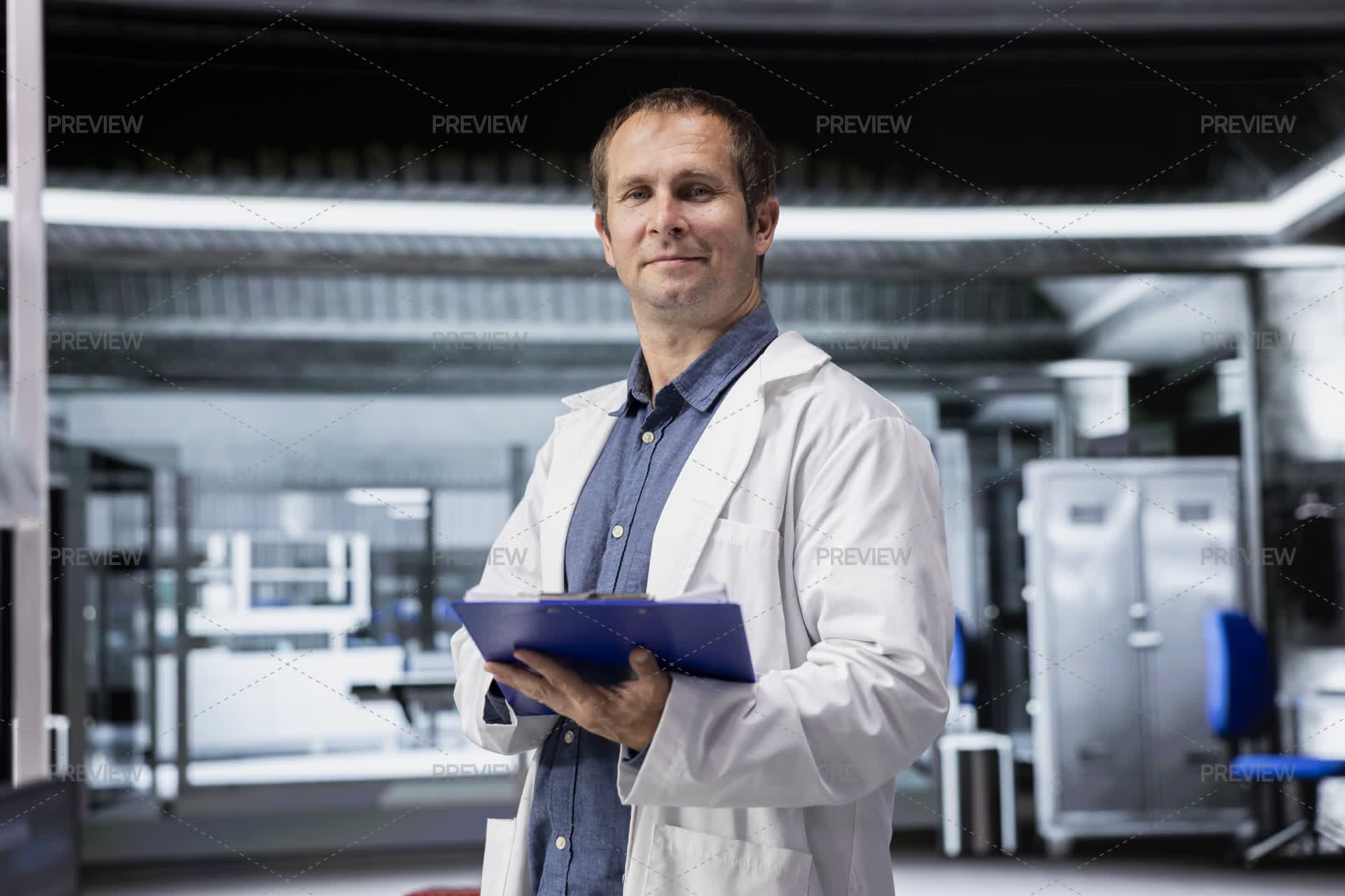 Expert Lab Portrait Of Scientific Expert Posing With White Coat And Files In ...