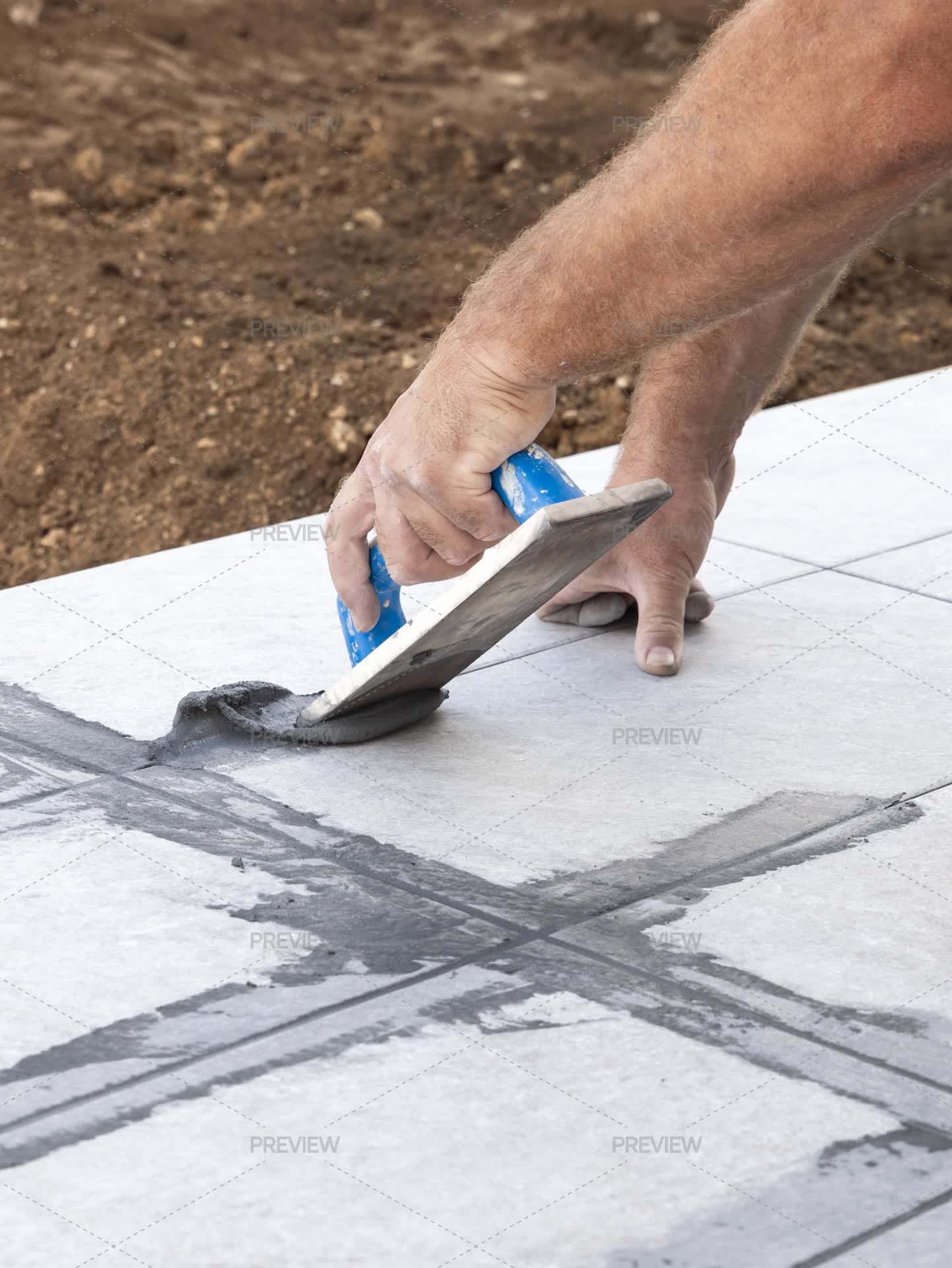 Array Grout Man Hand Filling Tile Joints With Grout Using Float Closeup ...