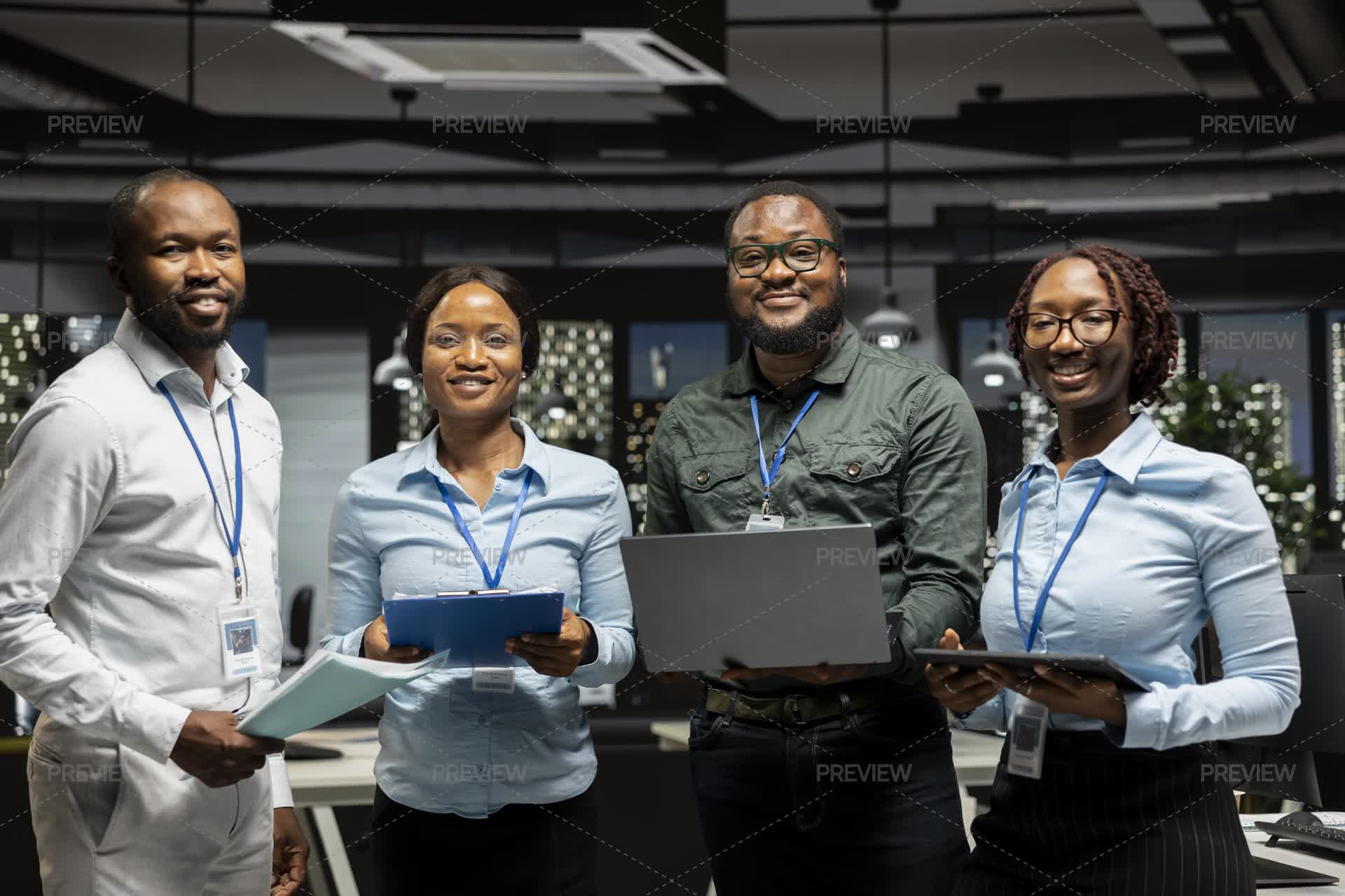 Portrait Of Employees Working With Performance Metrics - Stock Photos ...