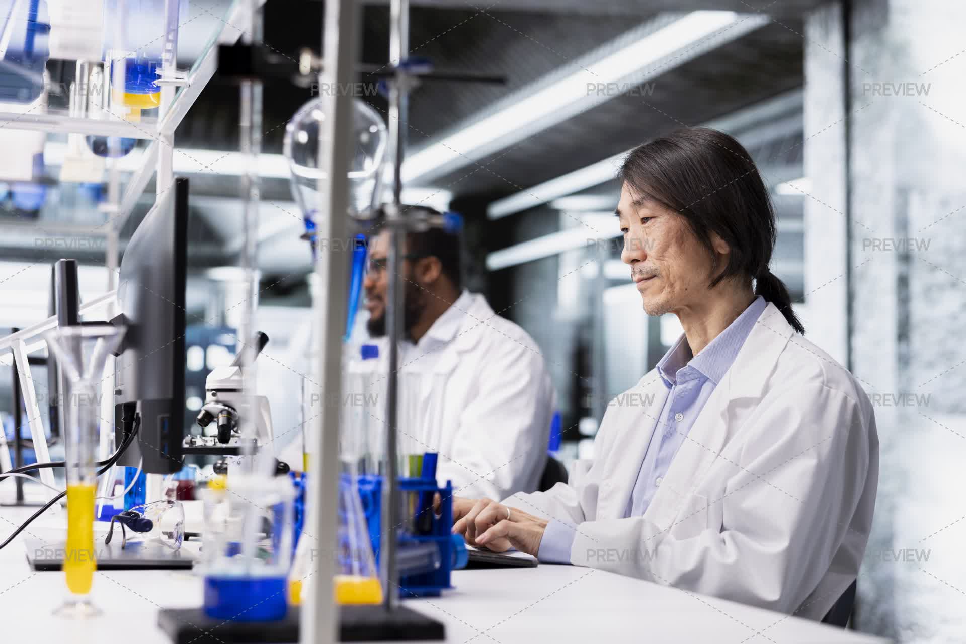 Retirement Lab Tech Senior Laboratory Technician Using Computer Application For DNA Data ...