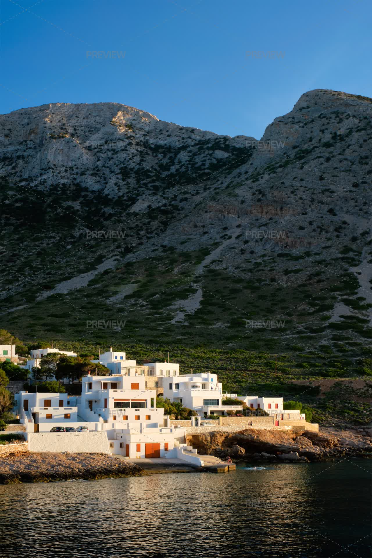 Kamares Town With Traditional White Houses On Sifnos Island On Sunset ...