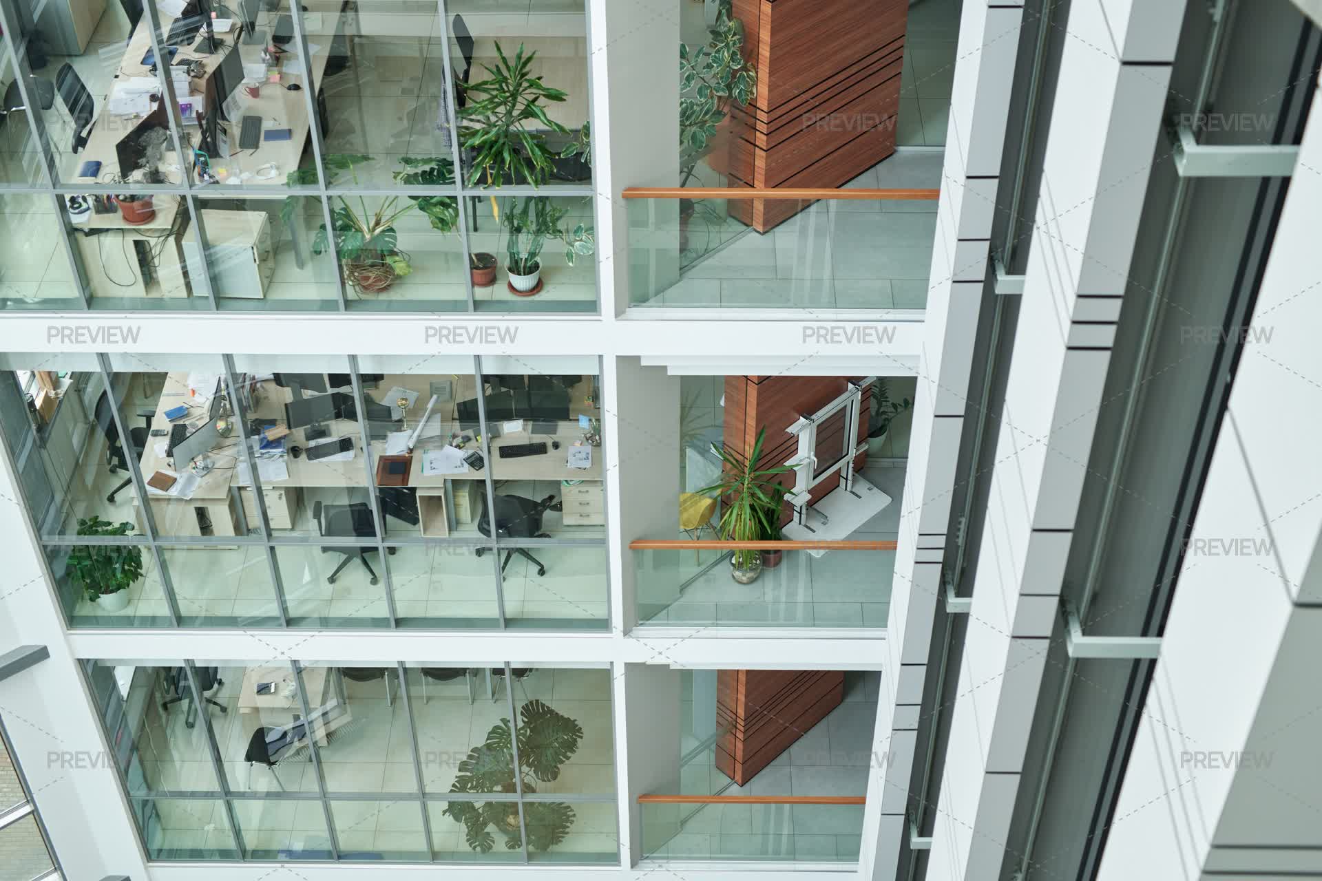 Part Of Multi-storey Building With Openspace Offices Behind Large ...