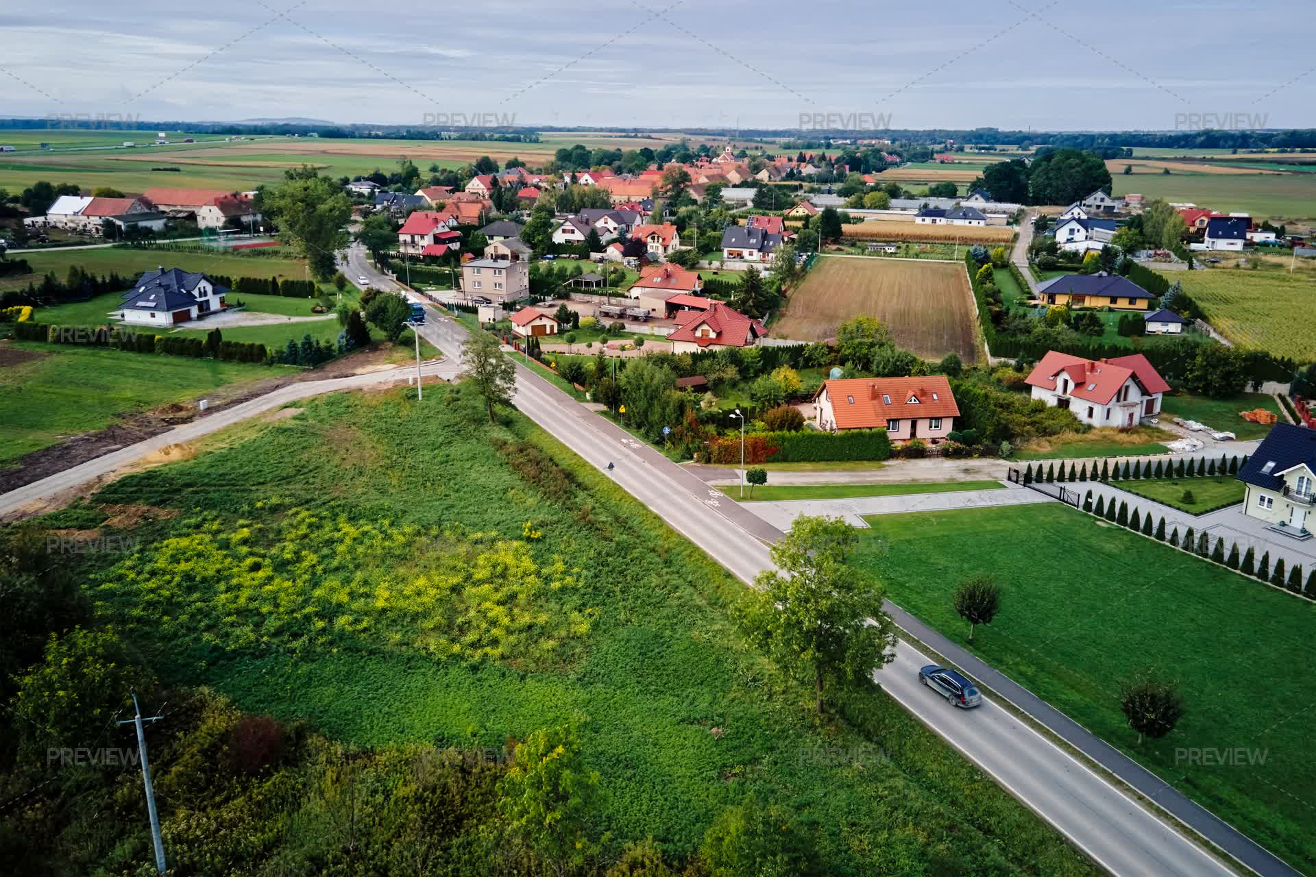 https://cms-artifacts.motionarray.com/content/motion-array/3986932/Aerial_View_Of_Rural_Village_With_Houses_high_resolution_preview_3986932_1762711490.jpg?Expires=2078071493&Key-Pair-Id=K2ZDLYDZI2R1DF&Signature=c4~pKc75fQ7dCs6u~CS4rYNjHNudcRt3qYe~dYFD7KnwsKoJfLRe3Xv1~-7QDmK4F8pMLbBoDmmyczbUflDUJA2HlIC4dl~qmbJNtEaKz82yJ7U63HAsBjxkCiIeez5As9sjdYweaza1-Z-zATjcvEeiywzW7ptwrnl3E5uyfHfUaNmaLOtq5i0hxtaYOWXoTLIGIxJnNxmuACr30QK-MpxTNEtHFYbVi0VKd2LrrsKNa4M-2osp5yrzxvPPIGY9Lm60D~9aT33zy2QwSBFbetu1UsHFonmkpd2CLLmoXWYKQaNyExZwRvSppue5FBznCu7uO4L0qchU3bhmX~IxIg__