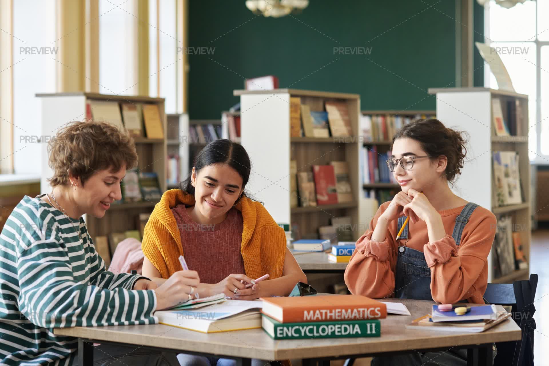 Students Studying Together In Bright Library Room - Stock Photos ...