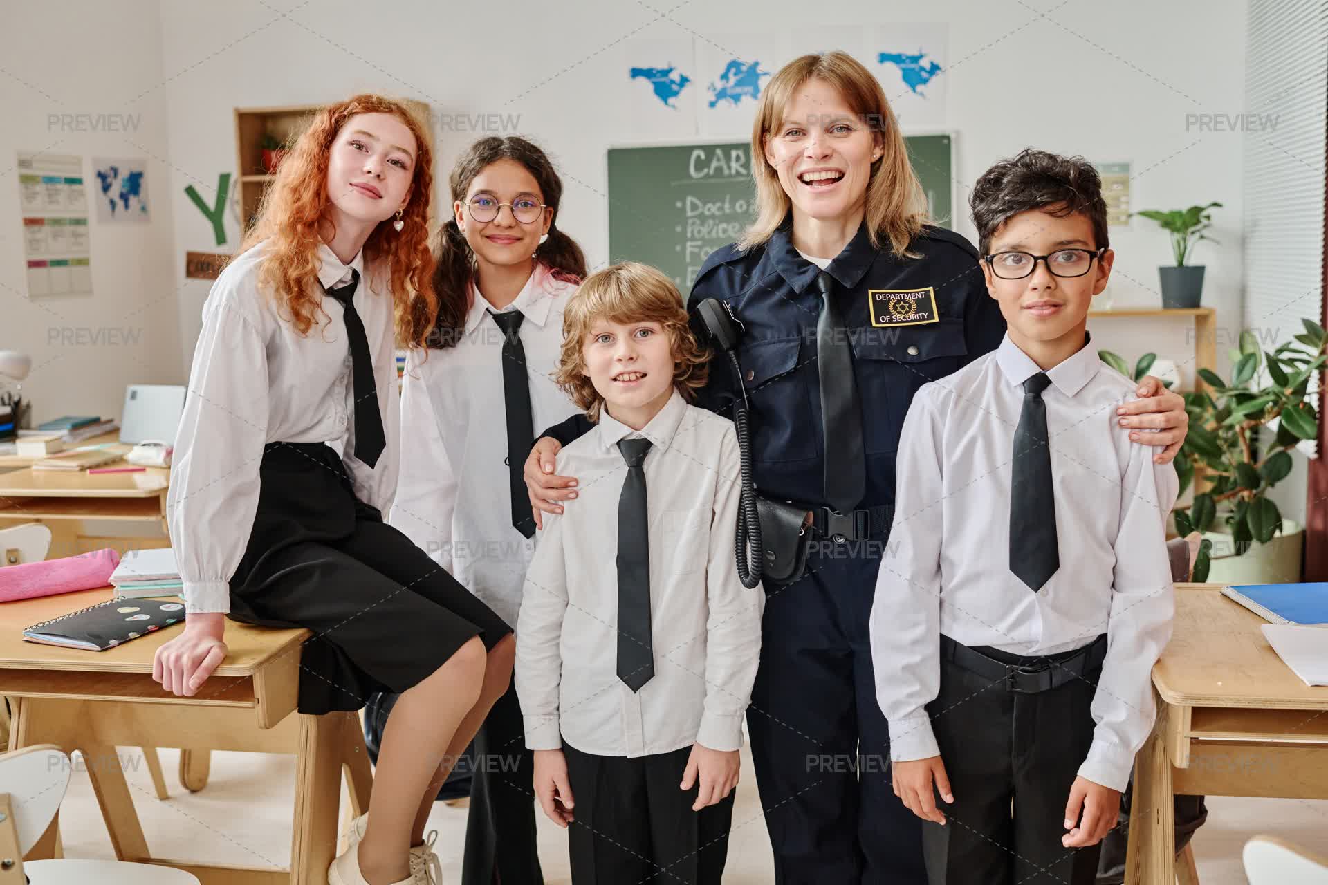 Police Officer And Group Of Teenagers In Classroom - Stock Photos ...
