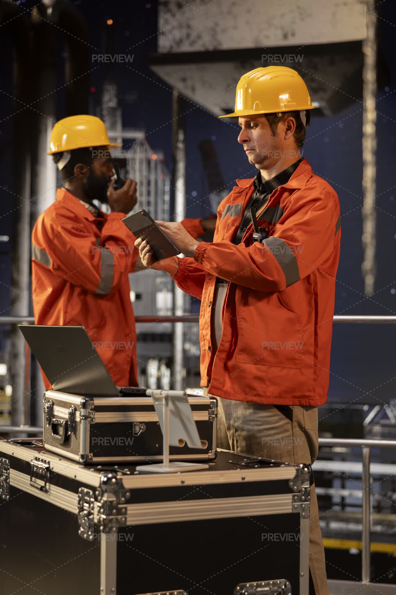 Environmental Engineer Uses Tablet On Offshore Rig Under The Northern ...