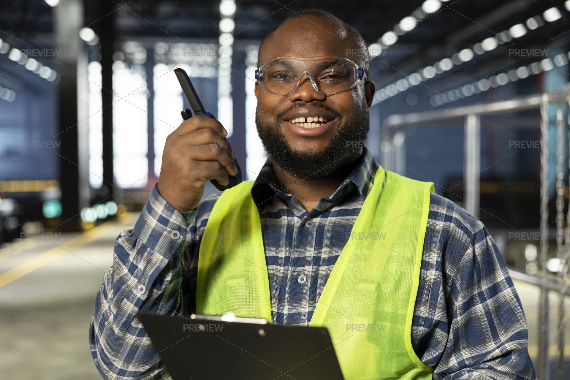 Employee Using Radio Personnel Uses Walkie Talkie Radio To Speak With Staff - Stock Photos ...