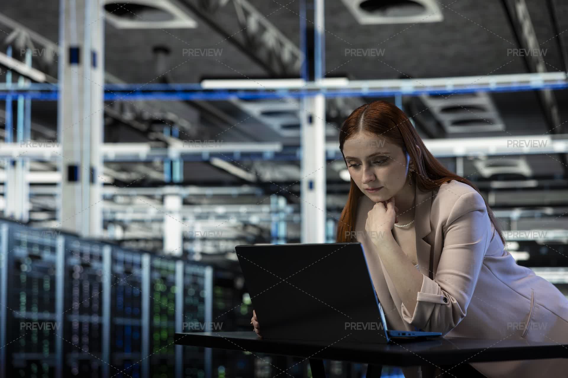 Data Center Software Developer Reviewing Network Configuration With ...