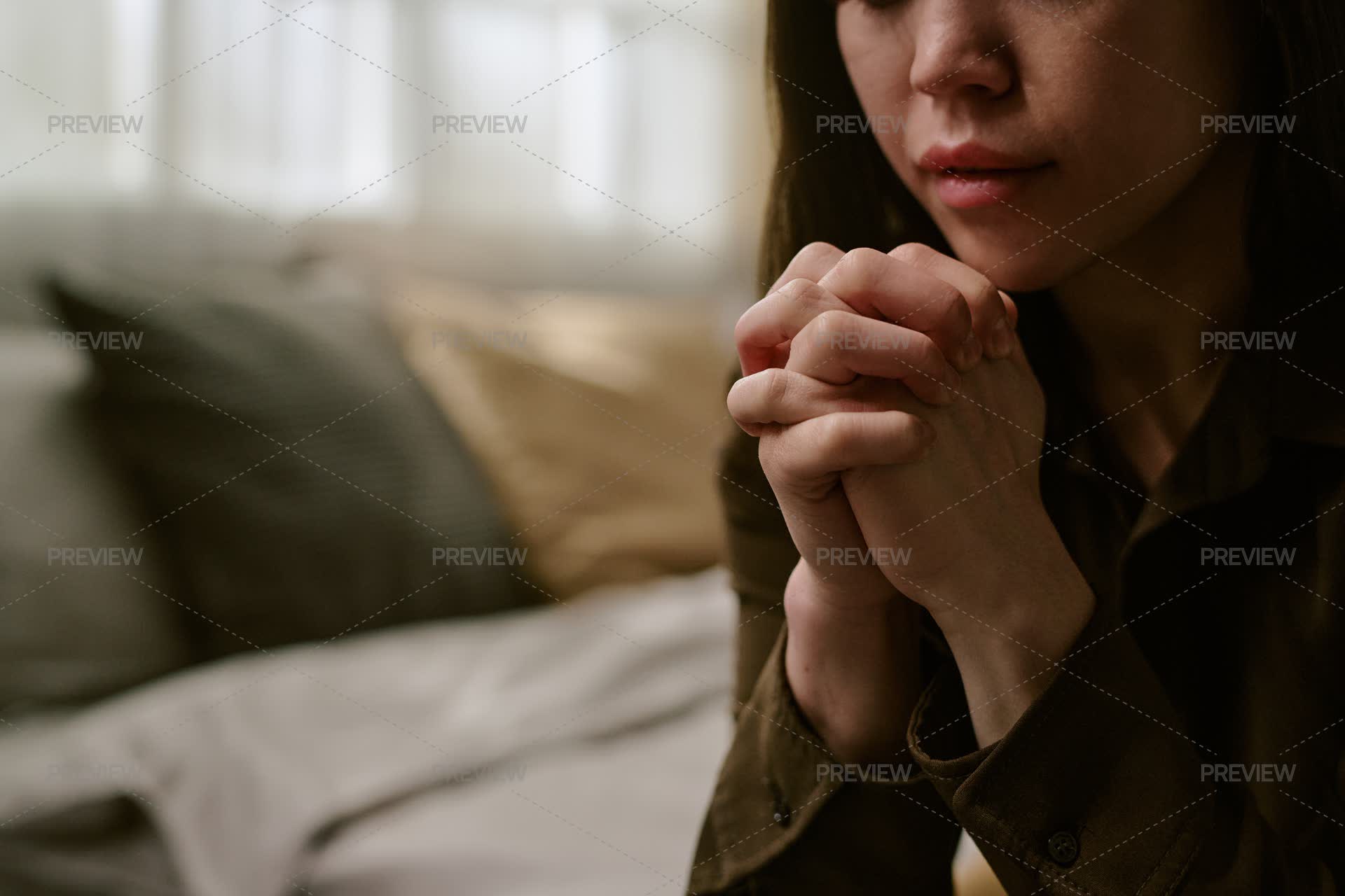 Praying Motion Young Adult Woman Praying With Hands Clasped Indoors by AnnaStills ...